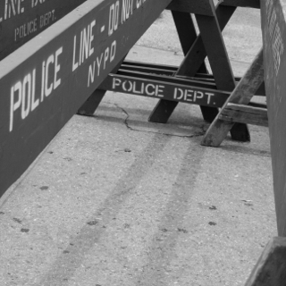 Black and white photograph of New York Police Department barriers taken by Alexandra Bogdanovic